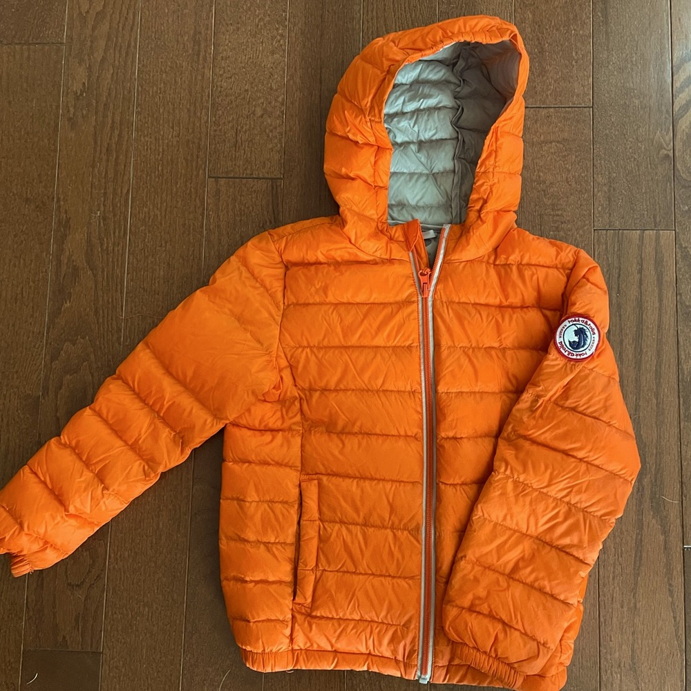 Kid’s lightweight and warm puffer Rokka and Rolla orange coat